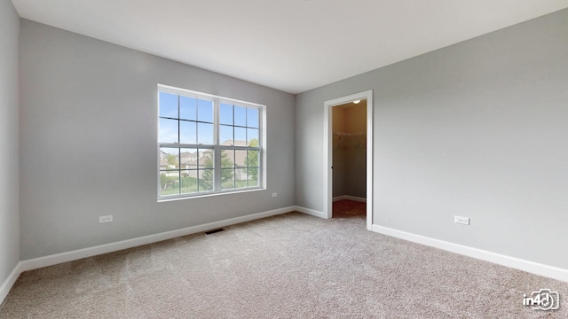 24433 W Bantry Ln, Shorewood, IL 60404 - spare room featuring carpet flooring and baseboards