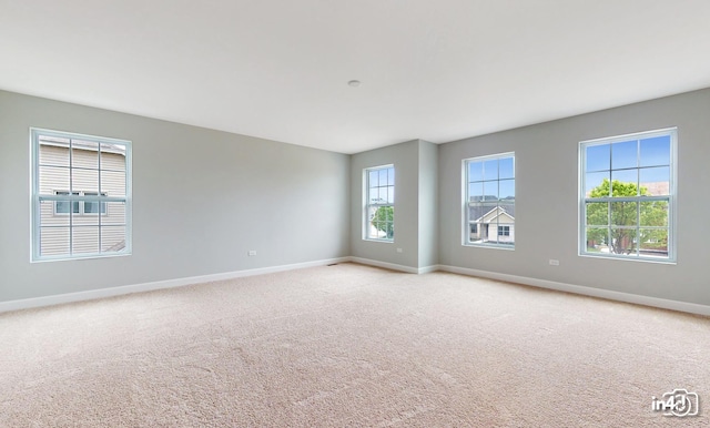 24433 W Bantry Ln, Shorewood, IL 60404 - empty room with baseboards and light colored carpet