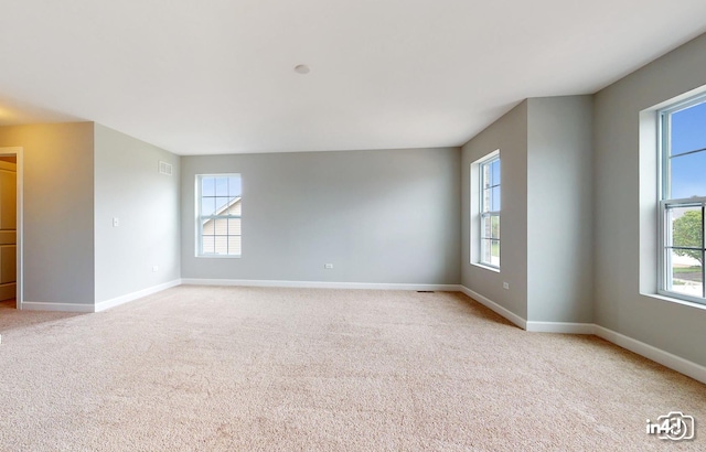 24433 W Bantry Ln, Shorewood, IL 60404 - unfurnished room with plenty of natural light and light carpet