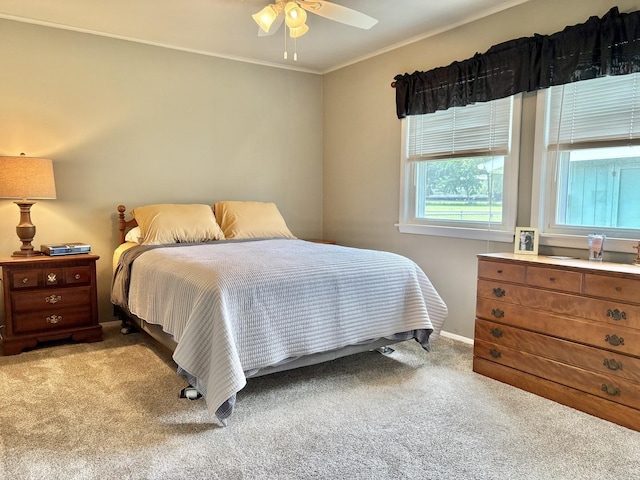1217 Retz Dr, Ottawa, IL 61350 - bedroom featuring light colored carpet, ornamental molding, and ceiling fan