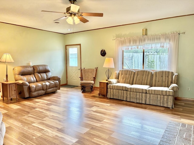 1217 Retz Dr, Ottawa, IL 61350 - living room featuring light wood finished floors, a ceiling fan, and ornamental molding