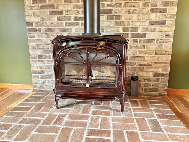1217 Retz Dr, Ottawa, IL 61350 - detailed view of a wood stove and baseboards
