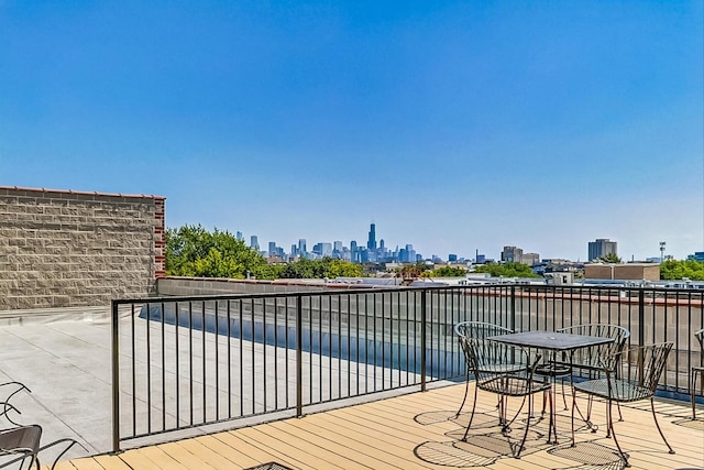 1740 N Maplewood Ave Unit 301, Chicago, IL 60647 - wooden deck with a view of skyline