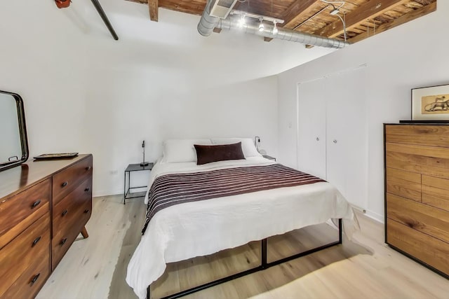 1740 N Maplewood Ave Unit 301, Chicago, IL 60647 - bedroom featuring light wood-style flooring and a closet