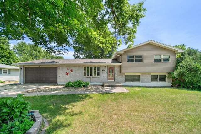 2689 Lynnville Ct, Lindenwood, IL 61049 - split level home featuring an attached garage, a front yard, driveway, and brick siding