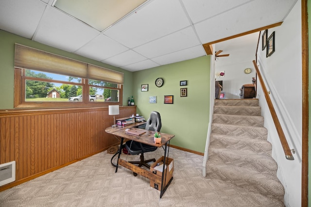 2689 Lynnville Ct, Lindenwood, IL 61049 - office space featuring carpet floors, a paneled ceiling, and wooden walls