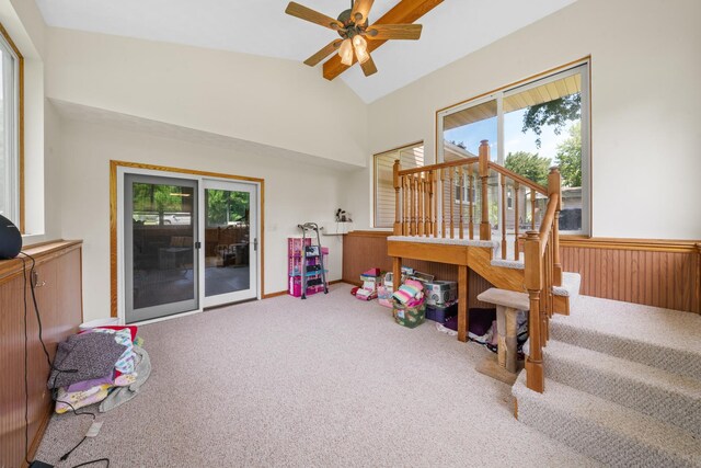 2689 Lynnville Ct, Lindenwood, IL 61049 - sitting room featuring carpet floors, vaulted ceiling, a ceiling fan, and stairs