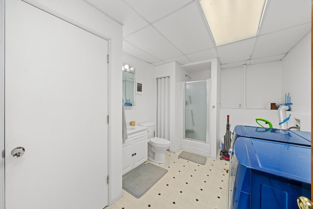 2689 Lynnville Ct, Lindenwood, IL 61049 - full bathroom featuring a stall shower, vanity, a drop ceiling, and tile patterned floors