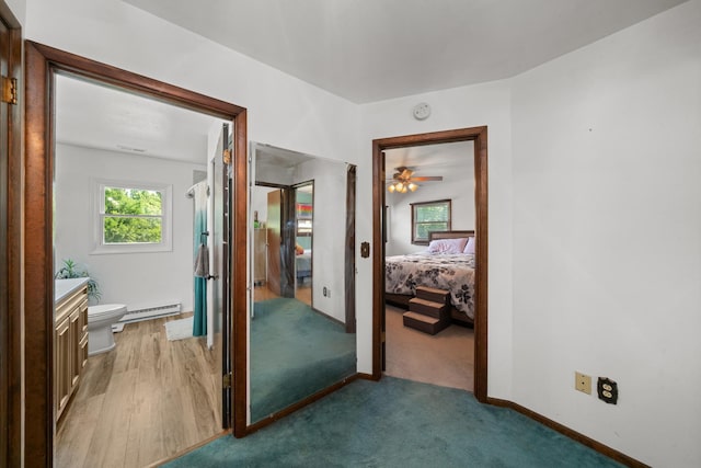 2689 Lynnville Ct, Lindenwood, IL 61049 - corridor featuring a baseboard radiator and carpet floors