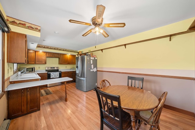 2689 Lynnville Ct, Lindenwood, IL 61049 - dining space featuring ceiling fan and light wood-style floors