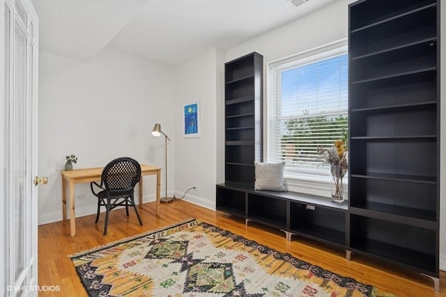4637 N Drake Ave Unit 3, Chicago, IL 60625 - home office featuring baseboards and wood finished floors