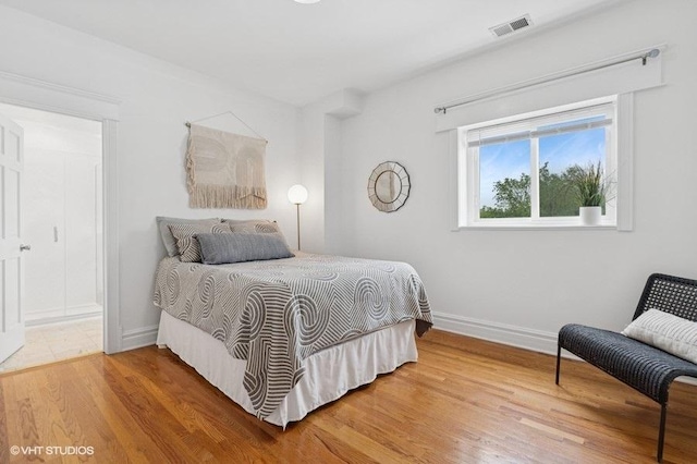 4637 N Drake Ave Unit 3, Chicago, IL 60625 - bedroom with baseboards and wood finished floors