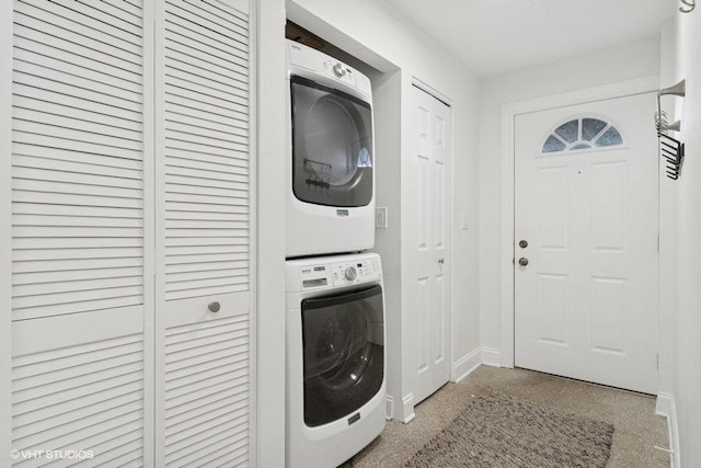 4637 N Drake Ave Unit 3, Chicago, IL 60625 - laundry room with stacked washer / drying machine and baseboards