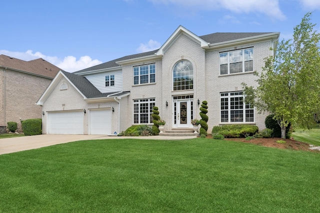 484 W Haleys Hill Ct, Palatine, IL 60074 - colonial-style house with brick siding, a front yard, concrete driveway, and an attached garage