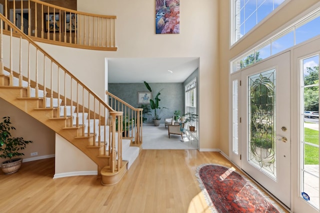 484 W Haleys Hill Ct, Palatine, IL 60074 - entrance foyer with healthy amount of natural light, wood finished floors, a high ceiling, and stairs