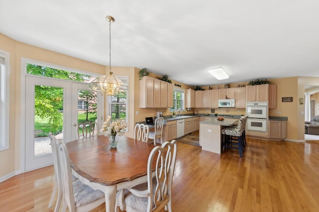 484 W Haleys Hill Ct, Palatine, IL 60074 - dining room with light wood-style floors and a chandelier