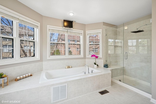 484 W Haleys Hill Ct, Palatine, IL 60074 - bathroom featuring a bath, a stall shower, and tile patterned flooring