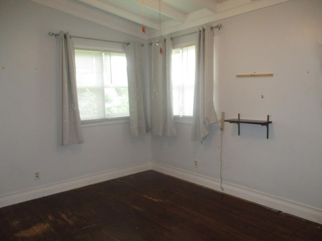 1110 Wacker Dr, Ottawa, IL 61350 - spare room featuring wood finished floors and beamed ceiling