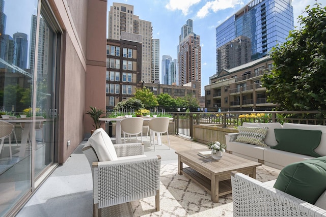 1101 S State St Unit 407, Chicago, IL 60605 - view of patio with an outdoor living space and a view of skyline