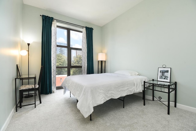 1101 S State St Unit 407, Chicago, IL 60605 - carpeted bedroom with lofted ceiling and baseboards