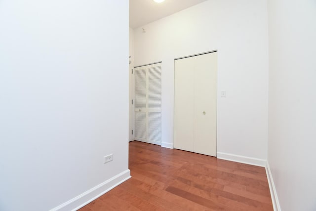 1101 S State St Unit 407, Chicago, IL 60605 - unfurnished bedroom featuring light wood finished floors and baseboards