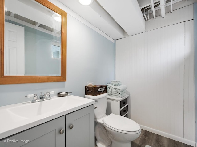 711 Bryant Ave, Barrington, IL 60010 - half bathroom featuring wood finished floors and vanity