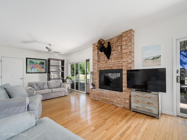 711 Bryant Ave, Barrington, IL 60010 - living area featuring hardwood / wood-style flooring, a brick fireplace, and ceiling fan