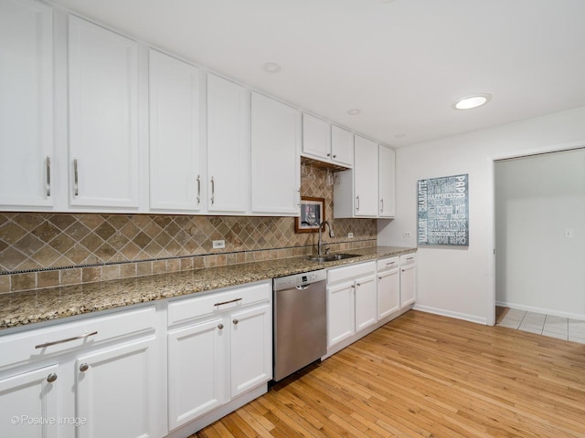 711 Bryant Ave, Barrington, IL 60010 - kitchen featuring stainless steel dishwasher, backsplash, white cabinetry, light wood-type flooring, and recessed lighting