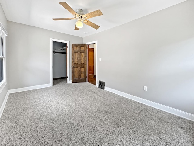 2423 Collins St, Blue Island, IL 60406 - unfurnished bedroom featuring a closet, carpet floors, and ceiling fan