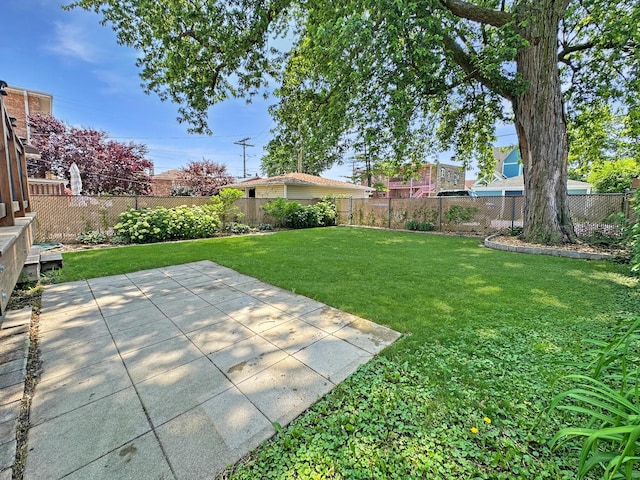 2423 Collins St, Blue Island, IL 60406 - fenced backyard with a patio