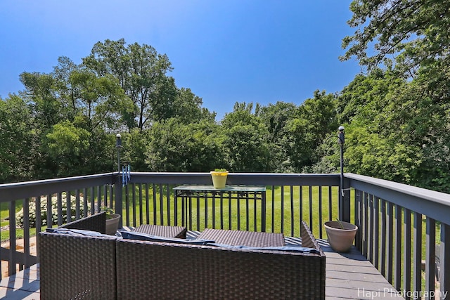 7523 Hickory, Wonder Lake, IL 60097 - wooden deck featuring a lawn