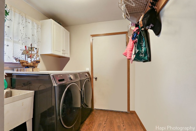 7523 Hickory, Wonder Lake, IL 60097 - laundry room featuring washer and clothes dryer, cabinet space, and wood finished floors