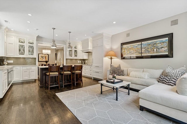 1725 N Fremont St, Chicago, IL 60614 - living area with dark wood finished floors and recessed lighting