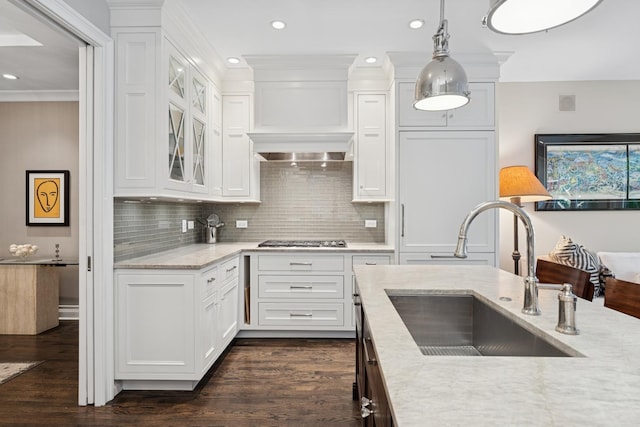 1725 N Fremont St, Chicago, IL 60614 - kitchen featuring recessed lighting, white cabinets, hanging light fixtures, dark wood-style floors, and glass insert cabinets