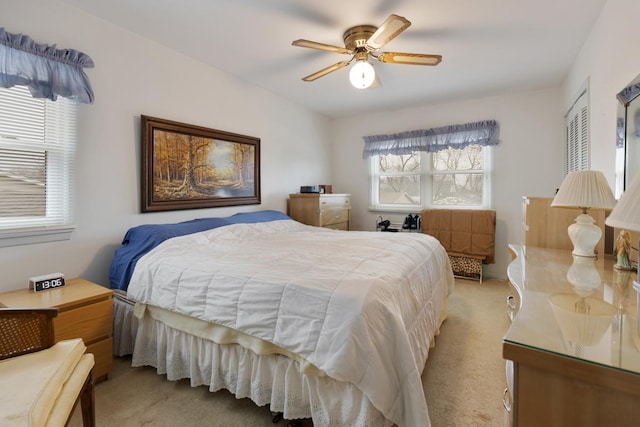 57 Brantwood Ave, Elk Grove Village, IL 60007 - bedroom with light carpet, multiple windows, and a ceiling fan