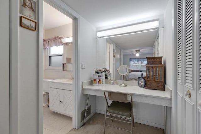 57 Brantwood Ave, Elk Grove Village, IL 60007 - bathroom with vanity, ceiling fan, tile patterned flooring, and a closet