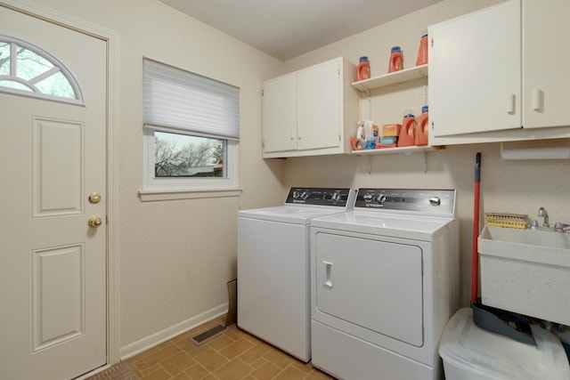 57 Brantwood Ave, Elk Grove Village, IL 60007 - laundry room featuring cabinet space, independent washer and dryer, and healthy amount of natural light