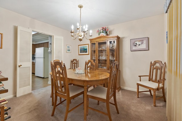 57 Brantwood Ave, Elk Grove Village, IL 60007 - dining space with a chandelier and light carpet