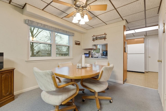 57 Brantwood Ave, Elk Grove Village, IL 60007 - dining space featuring light carpet, ceiling fan, and a drop ceiling