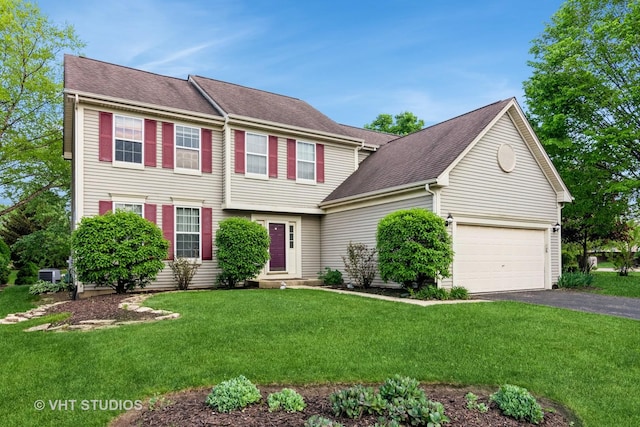 2909 Savannah Dr, Aurora, IL 60502 - view of front of property with driveway, a front yard, and a shingled roof