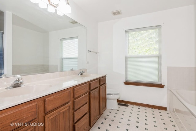 2909 Savannah Dr, Aurora, IL 60502 - full bath featuring tile patterned floors, a garden tub, and double vanity