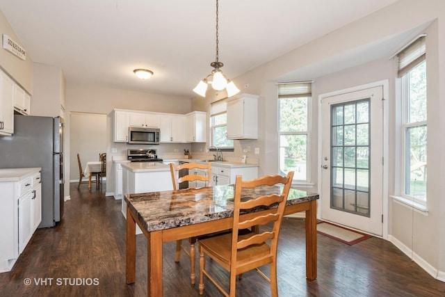 2909 Savannah Dr, Aurora, IL 60502 - dining space with dark wood-style flooring