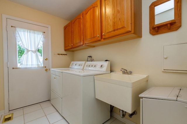 1304 W Whytecliff Rd, Palatine, IL 60067 - laundry room with washing machine and clothes dryer, cabinet space, and light tile patterned flooring