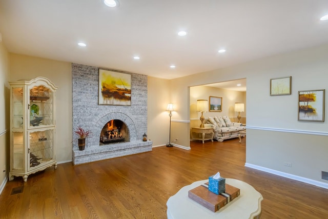 1304 W Whytecliff Rd, Palatine, IL 60067 - living area with wood finished floors, a brick fireplace, and recessed lighting