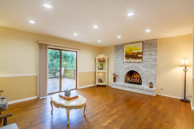1304 W Whytecliff Rd, Palatine, IL 60067 - living area with recessed lighting, wood finished floors, and a brick fireplace