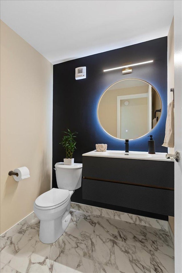 1230 N State Pkwy Unit 7D, Chicago, IL 60610 - bathroom featuring vanity and marble look tile flooring