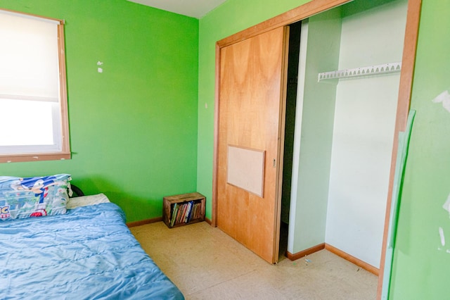 415 Swift Ave, Oglesby, IL 61348 - bedroom with baseboards and a closet