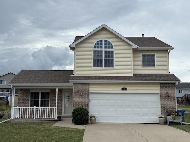 6 Kimberly Dr, Spring Valley, IL 61362 - traditional home featuring driveway, a garage, brick siding, covered porch, and roof with shingles