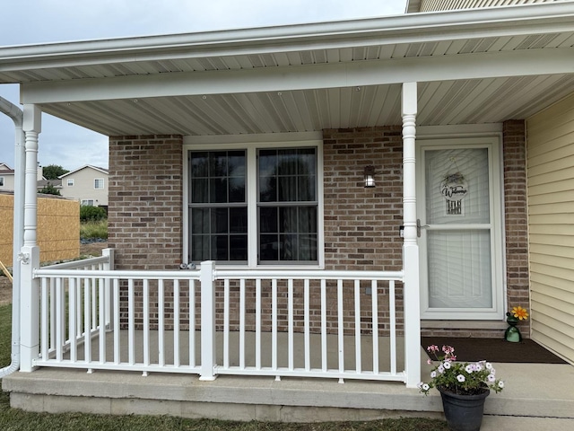 6 Kimberly Dr, Spring Valley, IL 61362 - doorway to property featuring covered porch and brick siding