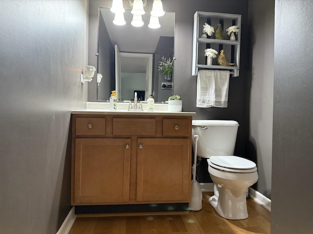 6 Kimberly Dr, Spring Valley, IL 61362 - bathroom with vanity, wood finished floors, and a chandelier